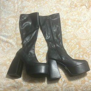 Black faux leather high heel boots. Size 10